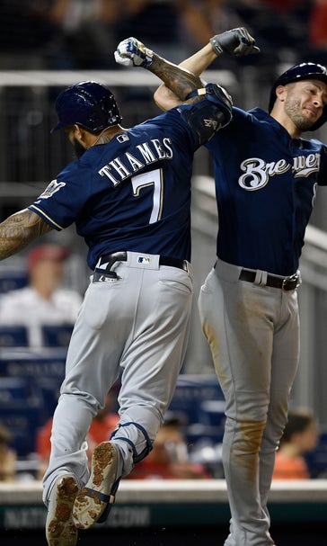 Thames' HR in 14th, Yelich's 2 help Brewers beat Nats 15-14